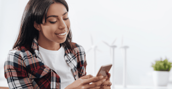 woman looking at her phone